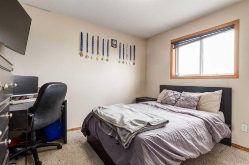 191 Panamount Heights Nw, Calgary, AB - Indoor Photo Showing Bedroom