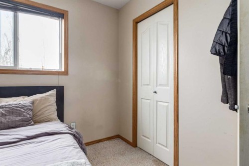 191 Panamount Heights Nw, Calgary, AB - Indoor Photo Showing Bedroom