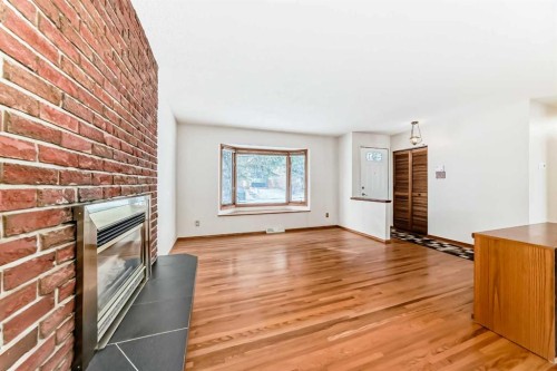 3408 Boulton Road Nw, Calgary, AB - Indoor With Fireplace