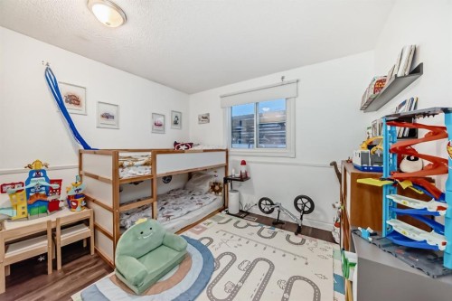 131 Huntstrom Drive Ne, Calgary, AB - Indoor Photo Showing Bedroom