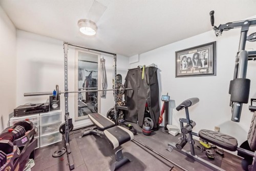 131 Huntstrom Drive Ne, Calgary, AB - Indoor Photo Showing Gym Room