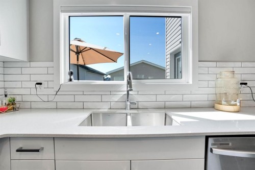 47 Lake Street, Rural Red Deer County, AB - Indoor Photo Showing Kitchen With Double Sink