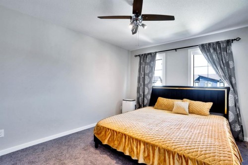 47 Lake Street, Rural Red Deer County, AB - Indoor Photo Showing Bedroom