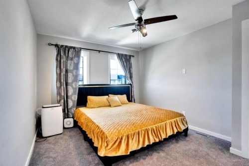 47 Lake Street, Rural Red Deer County, AB - Indoor Photo Showing Bedroom