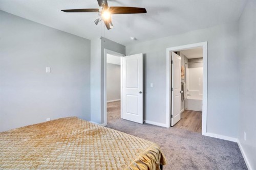 47 Lake Street, Rural Red Deer County, AB - Indoor Photo Showing Bedroom