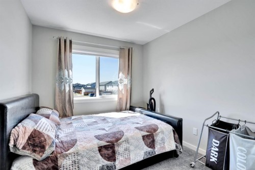 47 Lake Street, Rural Red Deer County, AB - Indoor Photo Showing Bedroom