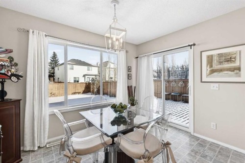 10 Cougar Ridge Bay Sw, Calgary, AB - Indoor Photo Showing Dining Room