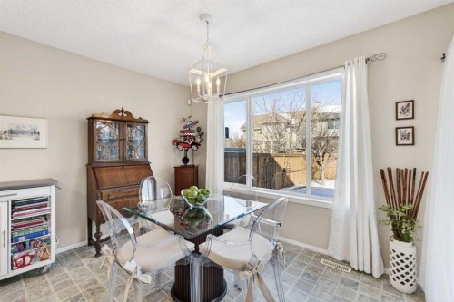 10 Cougar Ridge Bay Sw, Calgary, AB - Indoor Photo Showing Dining Room