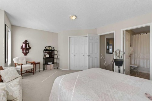 10 Cougar Ridge Bay Sw, Calgary, AB - Indoor Photo Showing Bedroom