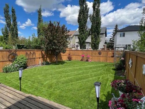 10 Cougar Ridge Bay Sw, Calgary, AB - Outdoor With Deck Patio Veranda With Backyard