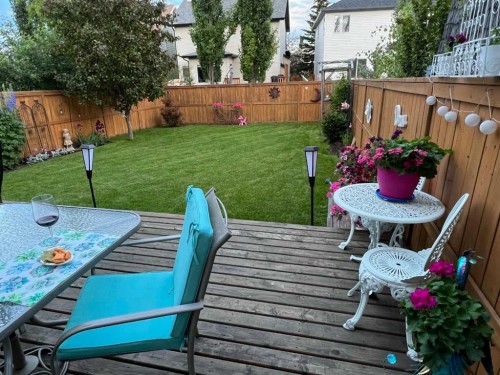 10 Cougar Ridge Bay Sw, Calgary, AB - Outdoor With Deck Patio Veranda With Backyard
