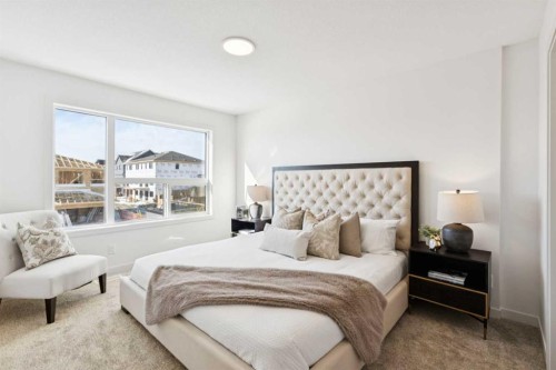 23 Heritage Heath, Cochrane, AB - Indoor Photo Showing Bedroom