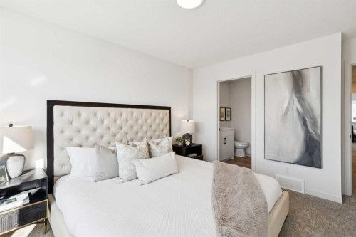 23 Heritage Heath, Cochrane, AB - Indoor Photo Showing Bedroom