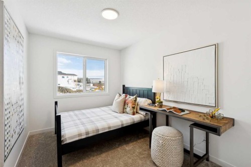 23 Heritage Heath, Cochrane, AB - Indoor Photo Showing Bedroom
