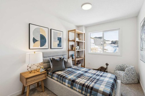 23 Heritage Heath, Cochrane, AB - Indoor Photo Showing Bedroom