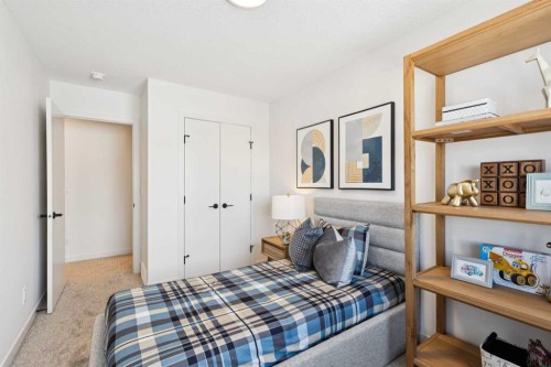 23 Heritage Heath, Cochrane, AB - Indoor Photo Showing Bedroom