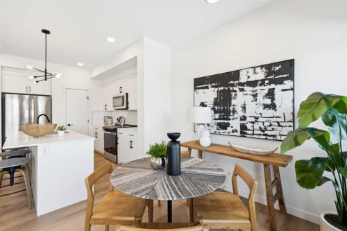 23 Heritage Heath, Cochrane, AB - Indoor Photo Showing Dining Room