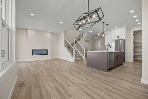 462 Kinniburgh Loop, Chestermere, AB - Indoor Photo Showing Kitchen With Upgraded Kitchen