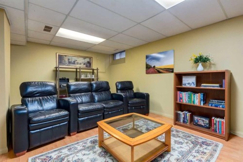 59-10030 Oakmoor Way Sw, Calgary, AB - Indoor Photo Showing Basement