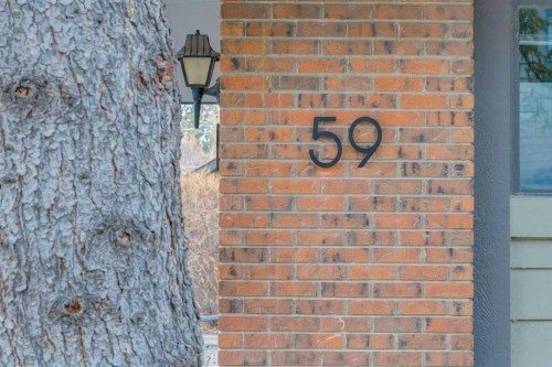 59-10030 Oakmoor Way Sw, Calgary, AB - Outdoor With Exterior