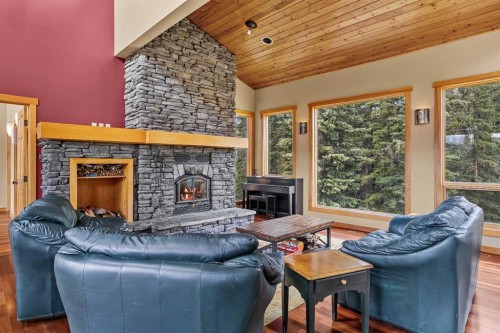 214 Eagle Point, Canmore, AB - Indoor Photo Showing Living Room With Fireplace