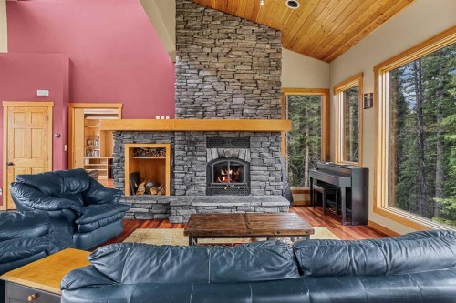 214 Eagle Point, Canmore, AB - Indoor Photo Showing Living Room With Fireplace