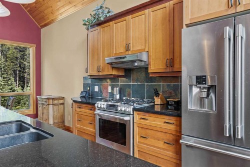 214 Eagle Point, Canmore, AB - Indoor Photo Showing Kitchen With Double Sink