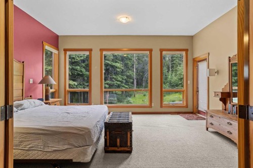 214 Eagle Point, Canmore, AB - Indoor Photo Showing Bedroom