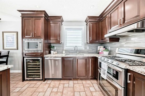 76 Riverside Way Se, Calgary, AB - Indoor Photo Showing Kitchen