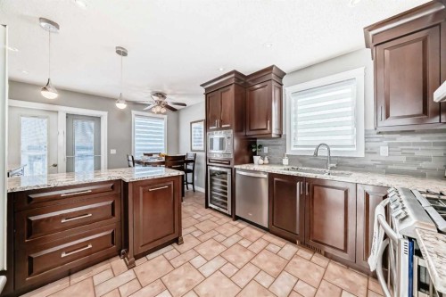 76 Riverside Way Se, Calgary, AB - Indoor Photo Showing Kitchen With Upgraded Kitchen