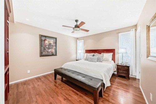 76 Riverside Way Se, Calgary, AB - Indoor Photo Showing Bedroom