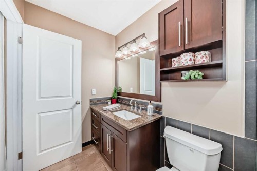 76 Riverside Way Se, Calgary, AB - Indoor Photo Showing Bathroom