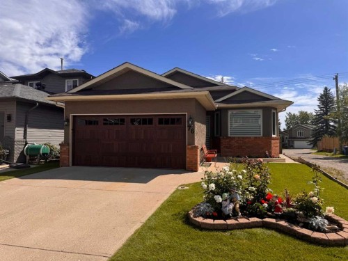 76 Riverside Way Se, Calgary, AB - Outdoor With Facade