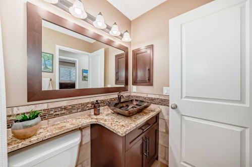 76 Riverside Way Se, Calgary, AB - Indoor Photo Showing Bathroom