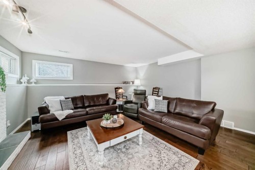 76 Riverside Way Se, Calgary, AB - Indoor Photo Showing Living Room