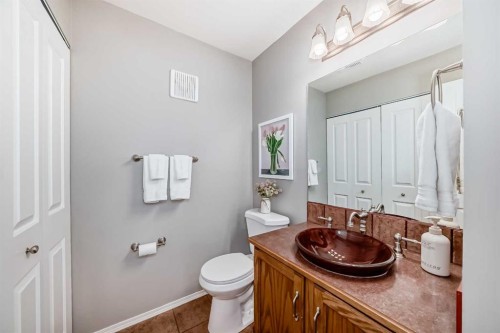 76 Riverside Way Se, Calgary, AB - Indoor Photo Showing Bathroom