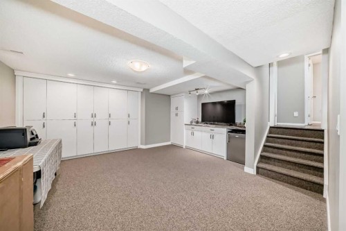 76 Riverside Way Se, Calgary, AB - Indoor Photo Showing Other Room