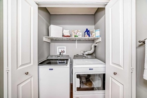 76 Riverside Way Se, Calgary, AB - Indoor Photo Showing Laundry Room
