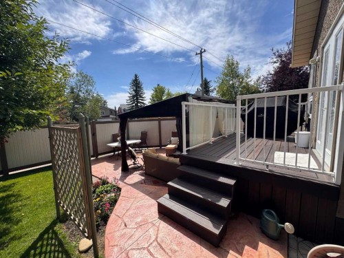 76 Riverside Way Se, Calgary, AB - Outdoor With Deck Patio Veranda With Exterior