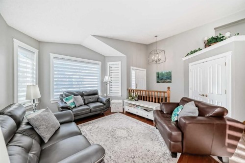 76 Riverside Way Se, Calgary, AB - Indoor Photo Showing Living Room