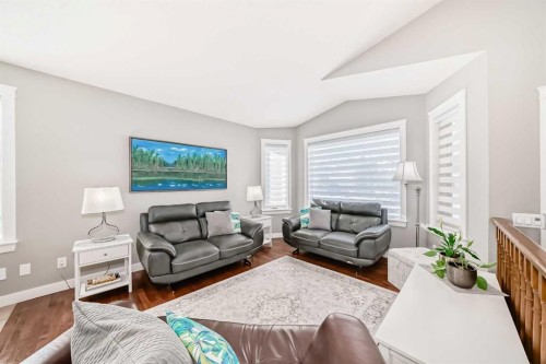 76 Riverside Way Se, Calgary, AB - Indoor Photo Showing Living Room
