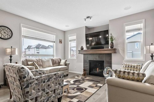 6 Drake Landing Loop, Okotoks, AB - Indoor Photo Showing Living Room With Fireplace