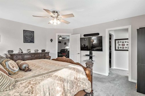 6 Drake Landing Loop, Okotoks, AB - Indoor Photo Showing Bedroom