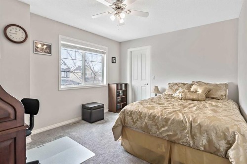 6 Drake Landing Loop, Okotoks, AB - Indoor Photo Showing Bedroom