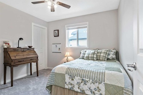 6 Drake Landing Loop, Okotoks, AB - Indoor Photo Showing Bedroom