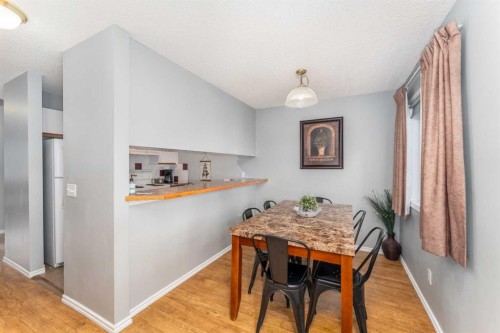 140-1202 Bow Valley Trail, Canmore, AB - Indoor Photo Showing Dining Room