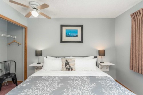 140-1202 Bow Valley Trail, Canmore, AB - Indoor Photo Showing Bedroom