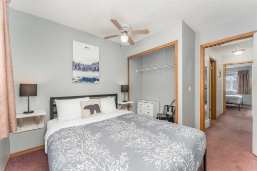 140-1202 Bow Valley Trail, Canmore, AB - Indoor Photo Showing Bedroom
