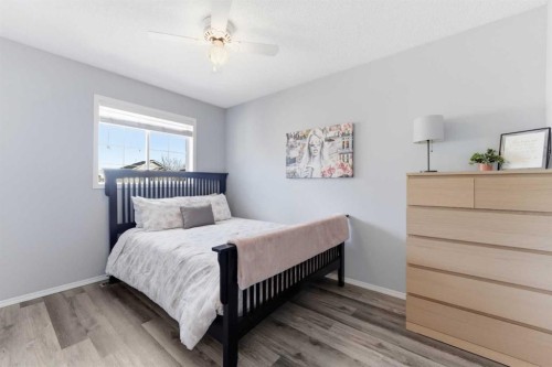 84 Mt Apex Green Se, Calgary, AB - Indoor Photo Showing Bedroom