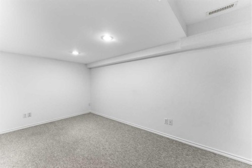 84 Mt Apex Green Se, Calgary, AB - Indoor Photo Showing Other Room